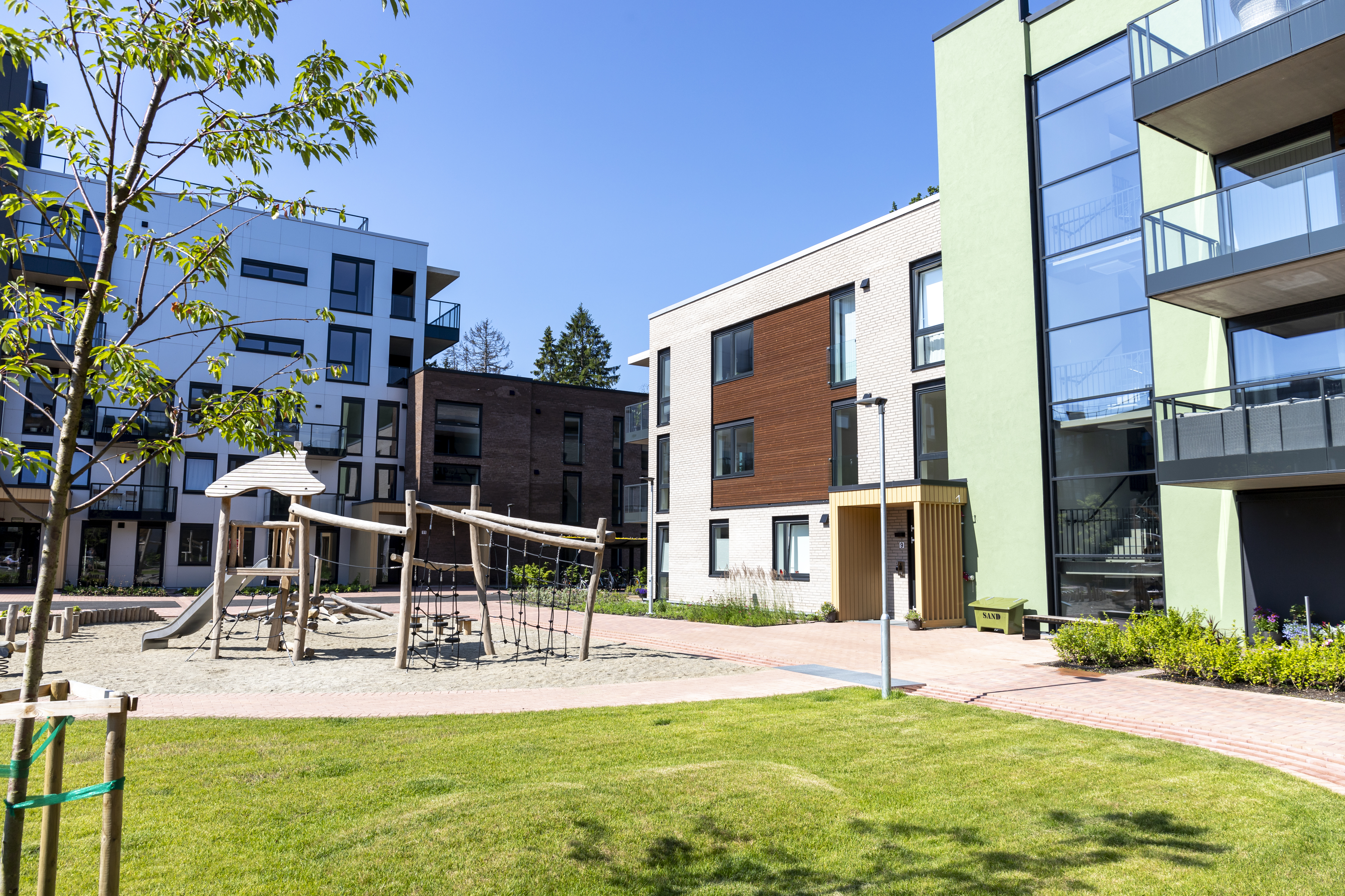 Kledning TRYR Skygrå Og Solbrun Dobbelfals Med Spor Brekketunet OBOS 3